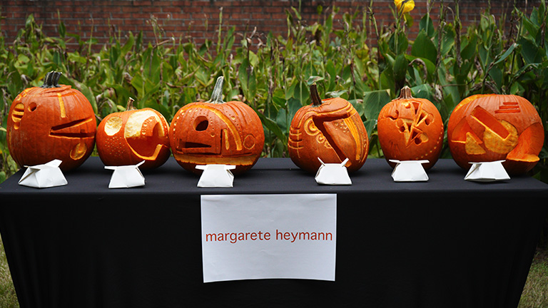 The carved pumpkin designs on this table were inspired by the industrial design work of Margarete Heymann.
